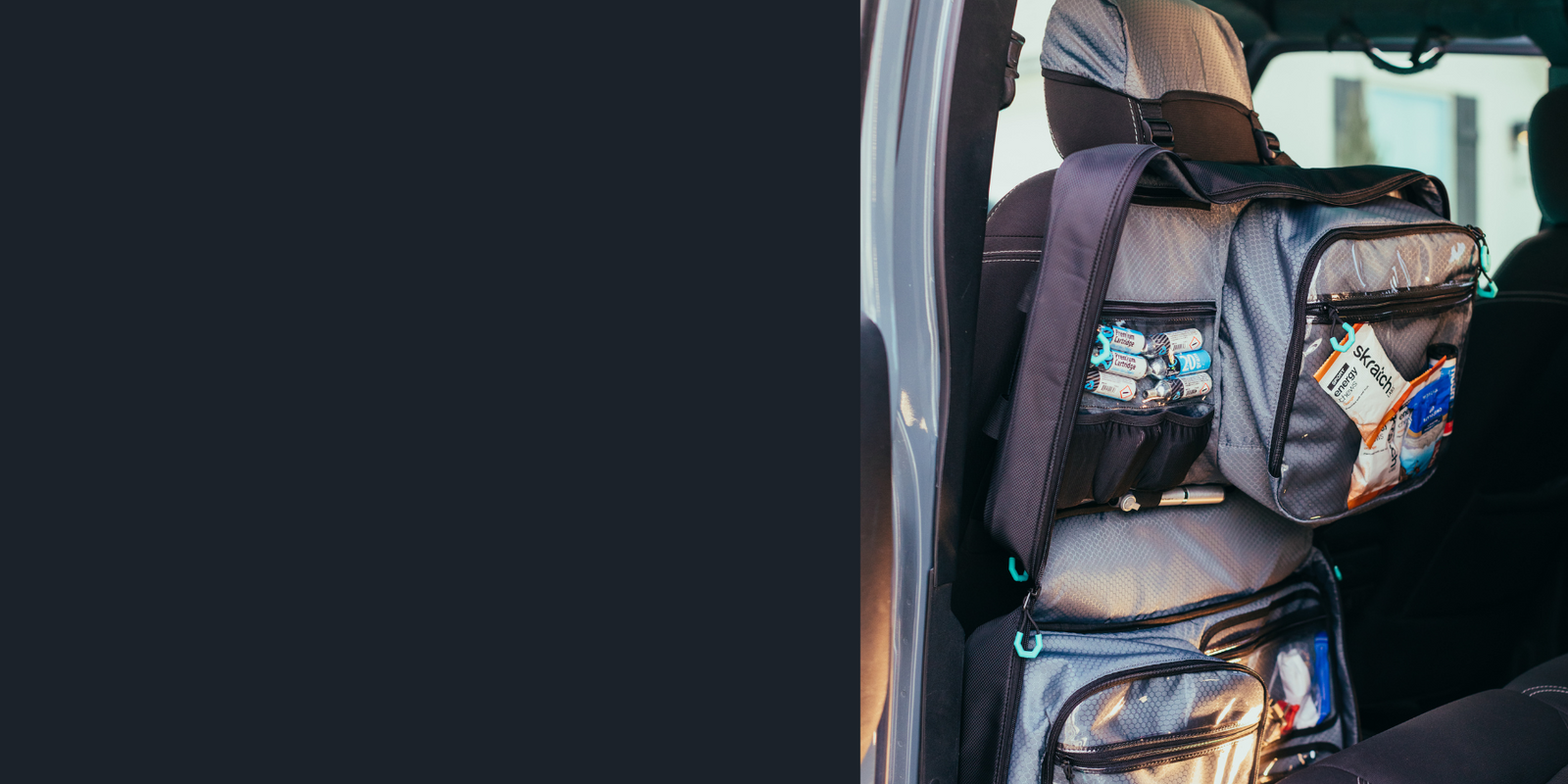 Half width photo shows Parc cycling gear bag hanging from headrest in car on back of car driver seat.