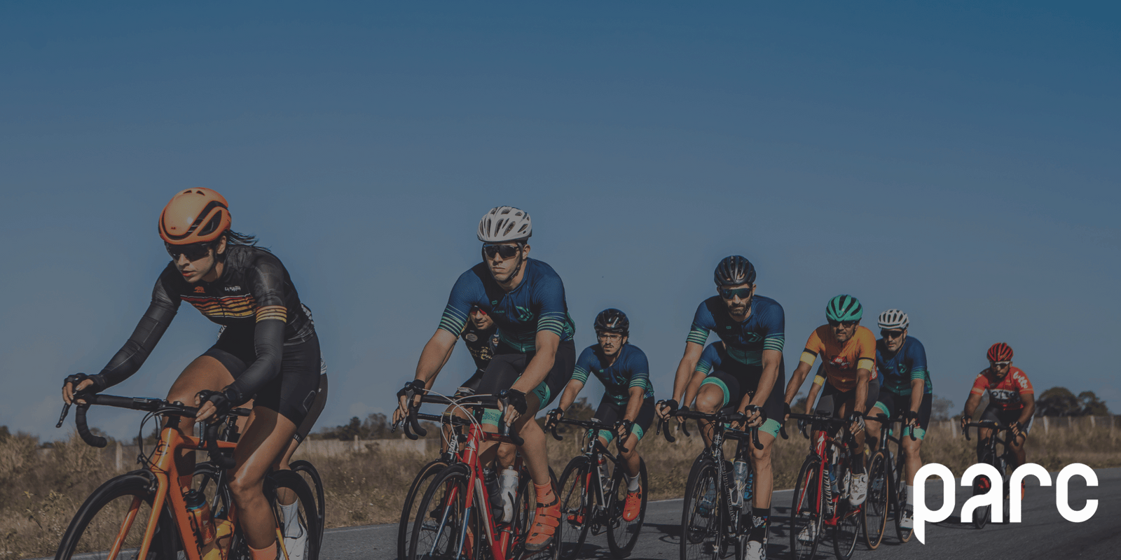 cyclists riding together in a group